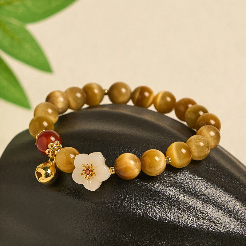 Bracelet courage en forme de clochette et œil de tigre doré naturel Buddha Stones - image 1