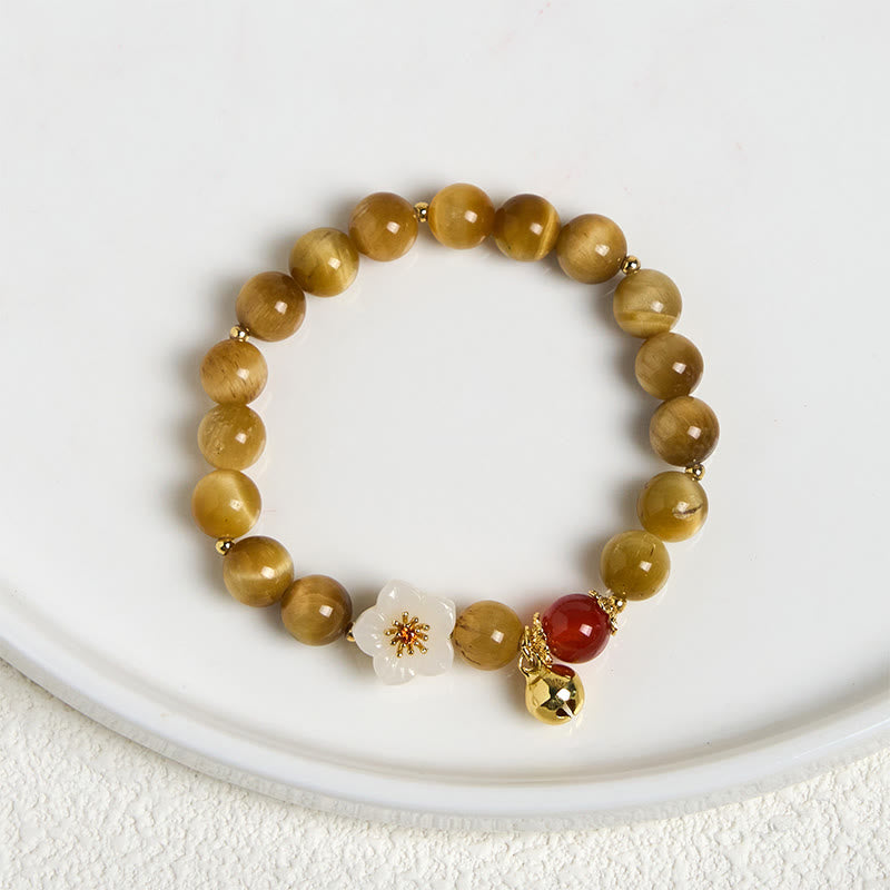 Bracelet courage en forme de clochette et œil de tigre doré naturel Buddha Stones - image 2