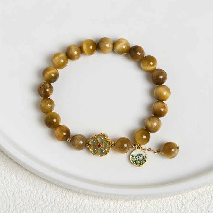 Bracelet courage en forme de clochette et œil de tigre doré naturel Buddha Stones - image 7