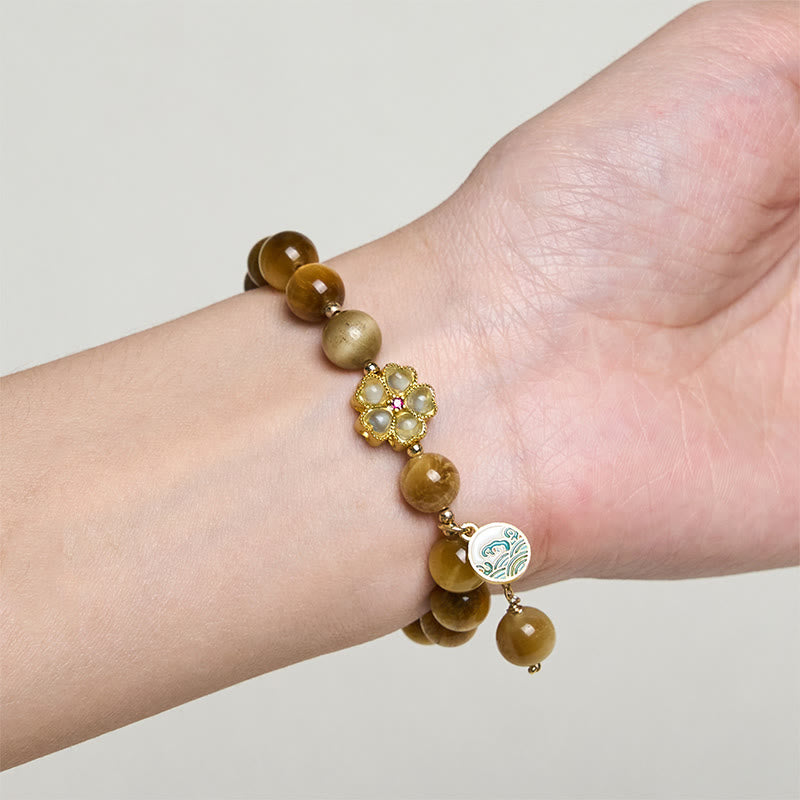Bracelet courage en forme de clochette et œil de tigre doré naturel Buddha Stones - image 8