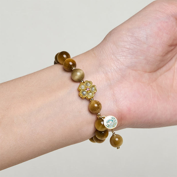 Bracelet courage en forme de clochette et œil de tigre doré naturel Buddha Stones - image 8