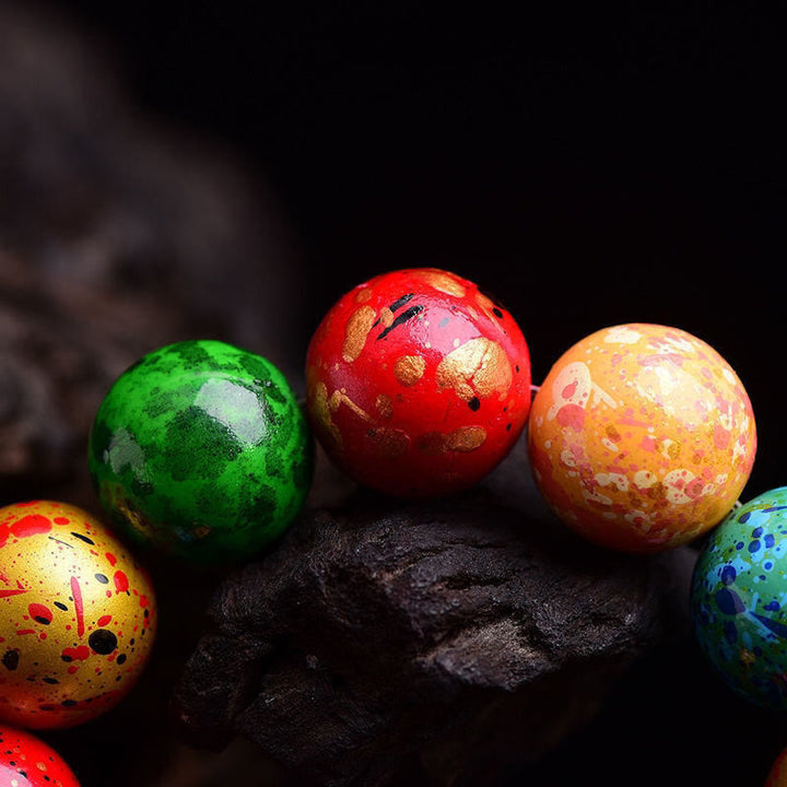 Bracelet de protection à un tour en perles de santal, laqué multicolore et orné de Buddha Stones - image 3