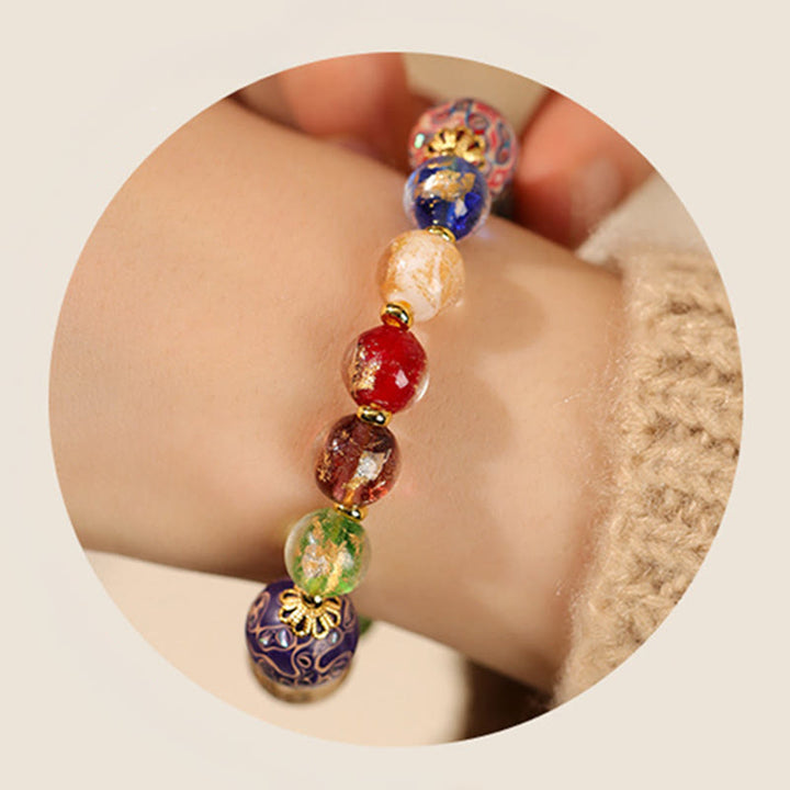 Bracelet artisanal en Buddha Stones, verre Liuli coloré, calebasse en bois de santal et perles laquées. - image 5