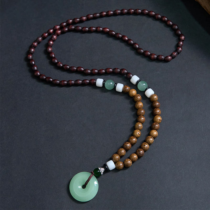 Collier avec pendentif en bois de wengé et Buddha Stones, boucle de paix, équilibre, tranquillité - image 1