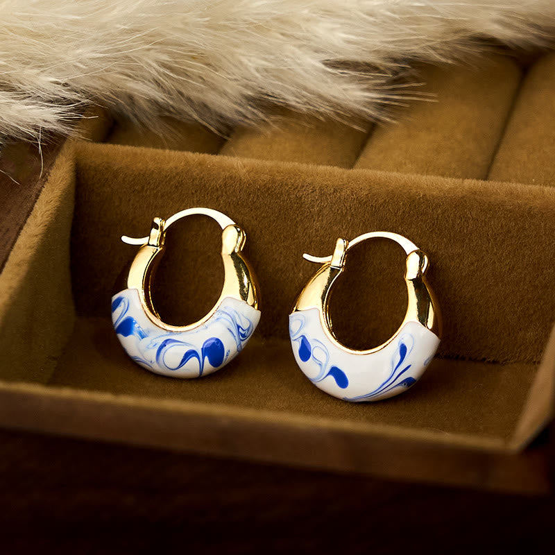 Boucles d'oreilles en forme de U en plaqué cuivre et émail doré 18 carats avec Buddha Stones - image 1