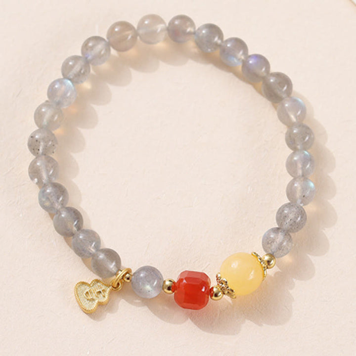 Bracelet Charmant Lotus Love en Pierres de Lune Naturelles et Buddha Stones - image 11