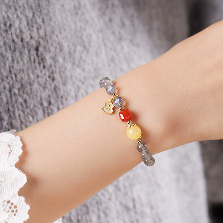 Bracelet Charmant Lotus Love en Pierres de Lune Naturelles et Buddha Stones - image 13
