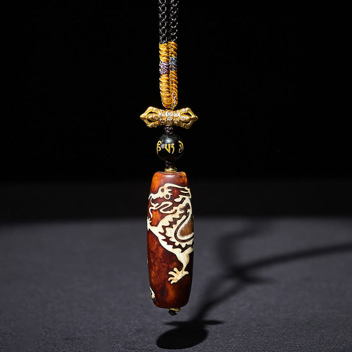 Collier pendentif Dzi à neuf yeux en agate tibétaine, motif dragon et Buddha Stones, orné d'un dragon et d'un dzi de protection. - image 1