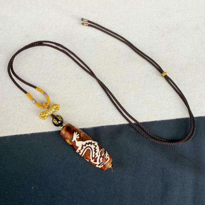 Collier pendentif Dzi à neuf yeux en agate tibétaine, motif dragon et Buddha Stones, orné d'un dragon et d'un dzi de protection. - image 3