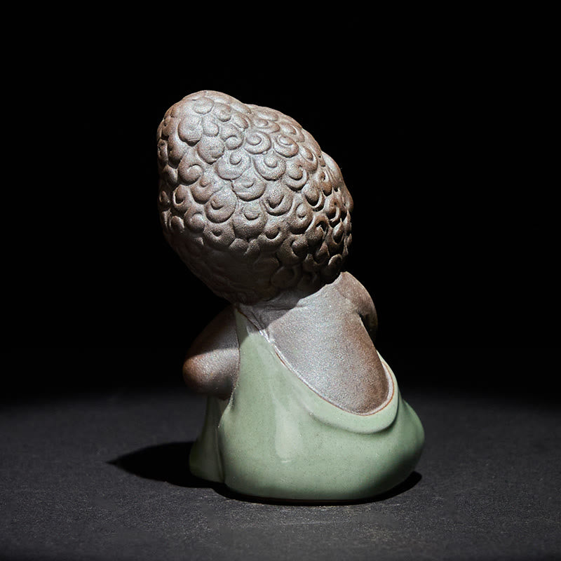 Statue de Buddha Stones en céramique représentant un moine en prière et méditation, symbole de sérénité et de décoration intérieure. - image 34