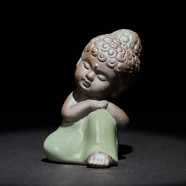 Statue de Buddha Stones en céramique représentant un moine en prière et méditation, symbole de sérénité et de décoration intérieure. - image 33