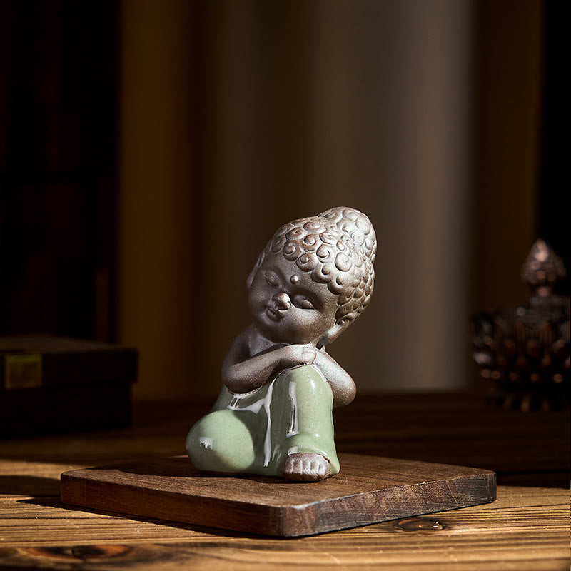 Statue de Buddha Stones en céramique représentant un moine en prière et méditation, symbole de sérénité et de décoration intérieure. - image 36