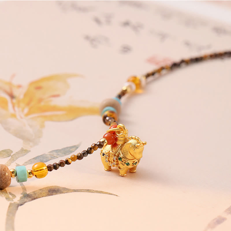 Collier pendentif œil de tigre en Buddha Stones, protection année dorée du Cheval - image 2