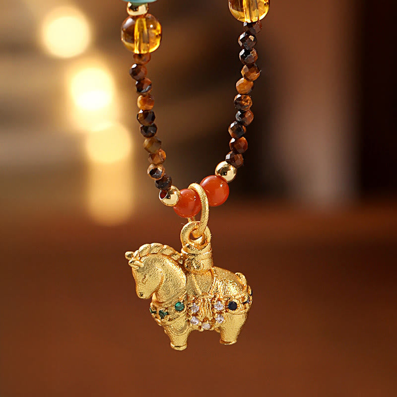 Collier pendentif œil de tigre en Buddha Stones, protection année dorée du Cheval - image 1