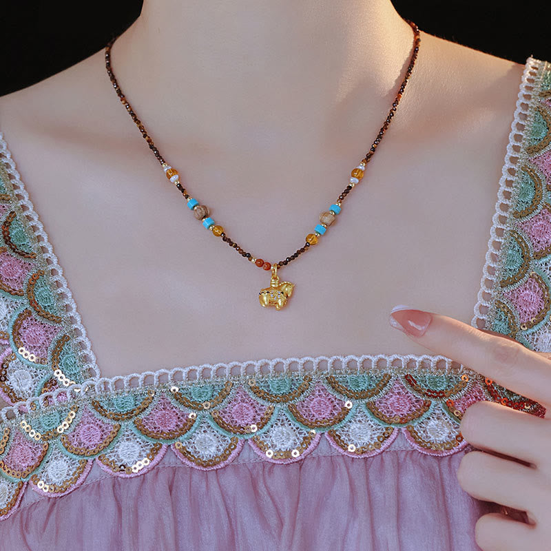 Collier pendentif œil de tigre en Buddha Stones, protection année dorée du Cheval - image 3