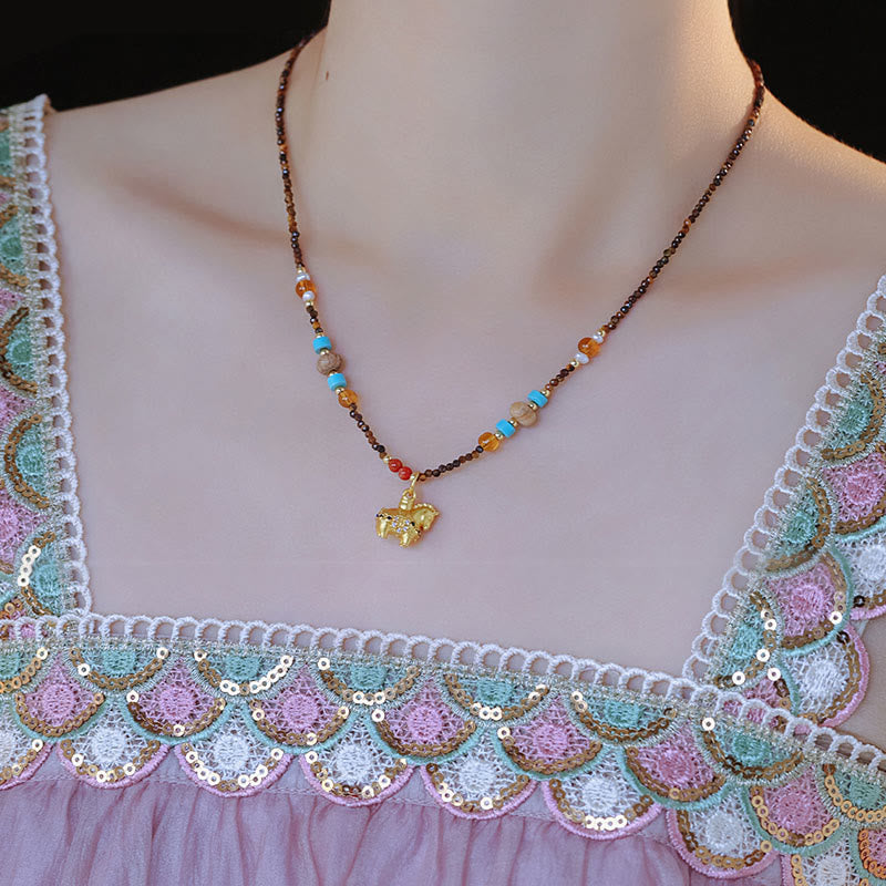 Collier pendentif œil de tigre en Buddha Stones, protection année dorée du Cheval - image 9