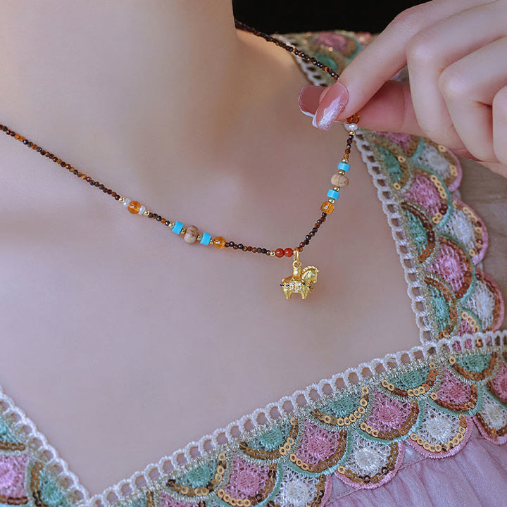 Collier pendentif œil de tigre en Buddha Stones, protection année dorée du Cheval - image 8