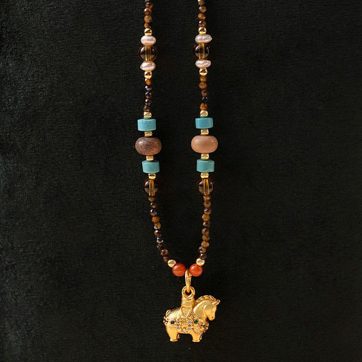 Collier pendentif œil de tigre en Buddha Stones, protection année dorée du Cheval - Œil de tigre - image 0