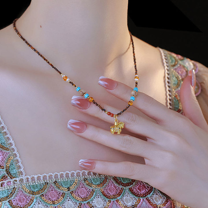 Collier pendentif œil de tigre en Buddha Stones, protection année dorée du Cheval - image 7