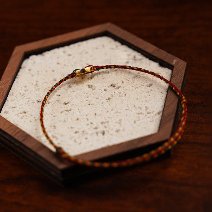 Bracelet de cheville ajustable en cordon tressé orné de pièces de cuivre artisanales en Buddha Stones et de breloques. - image 2