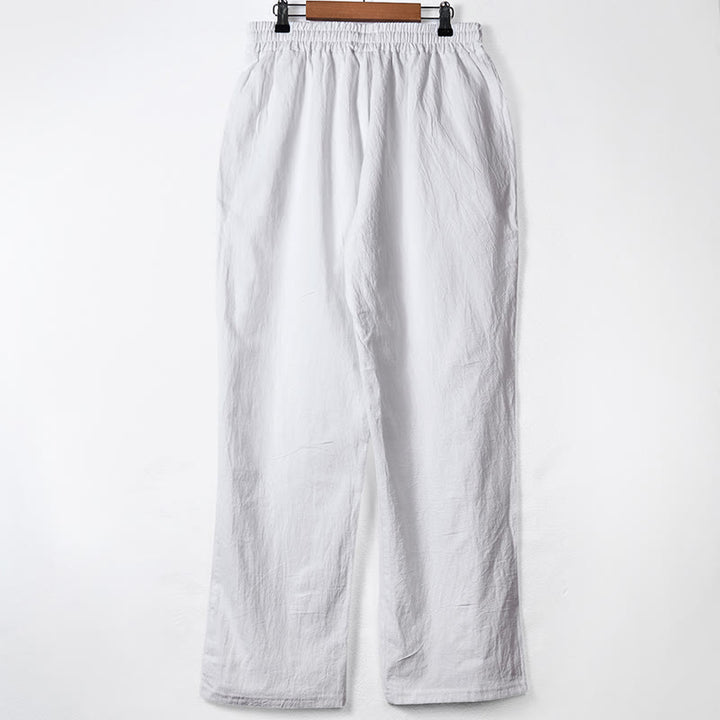 Pantalon en coton pour homme avec poches et boutons de couleur unie et cordon de serrage - image 10