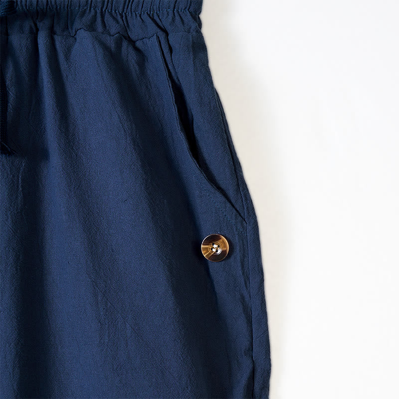 Pantalon en coton pour homme avec poches et boutons de couleur unie et cordon de serrage - image 3