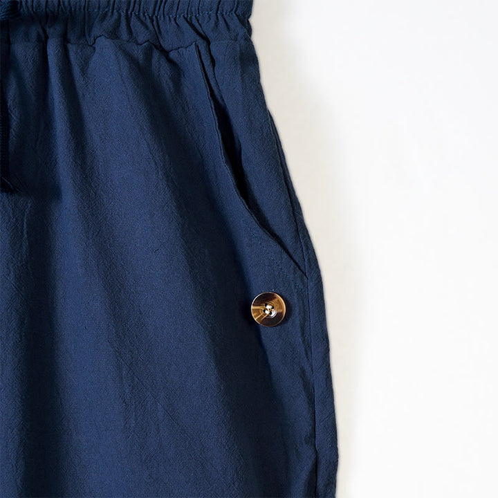 Pantalon en coton pour homme avec poches et boutons de couleur unie et cordon de serrage - image 3