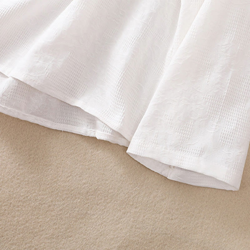 Chemise à manches longues en coton pour femme, brodée de Buddha Stones et au design asymétrique, avec boutons grenouille - image 13