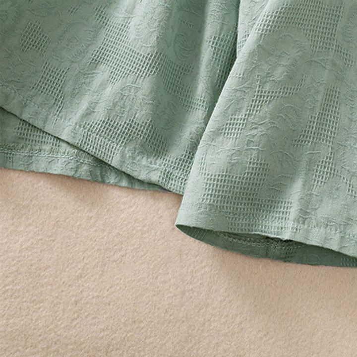 Chemise à manches longues en coton pour femme, brodée de Buddha Stones et au design asymétrique, avec boutons grenouille - image 6