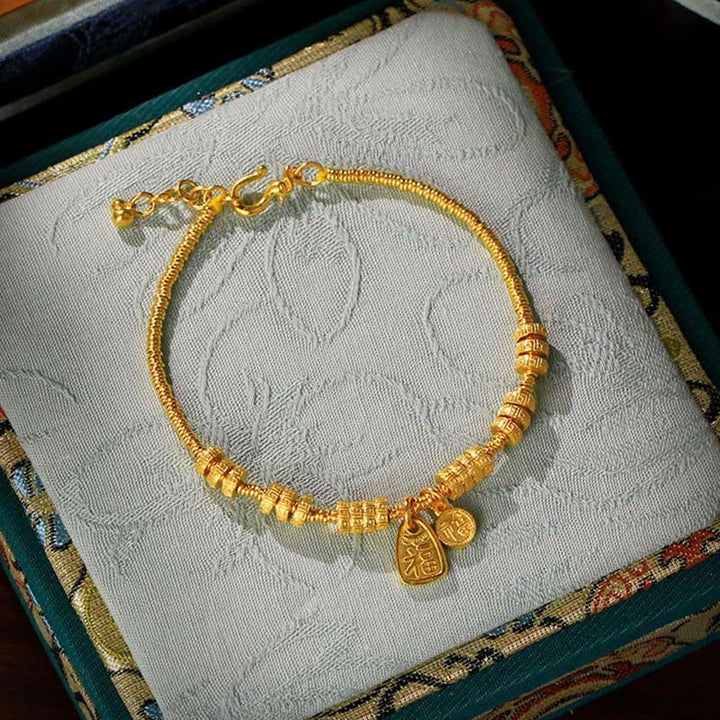 Bracelet porte-bonheur en laiton plaqué or 24 carats avec le caractère Fu et Buddha Stones - image 0