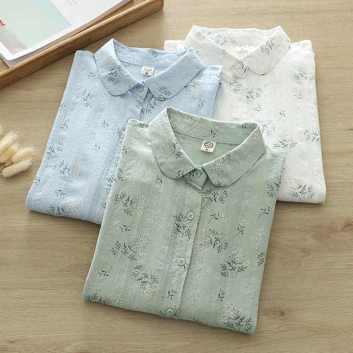 Chemise à manches longues en coton pour femme, ornée de Buddha Stones, de fleurs blanches et jaunes d'automne, de feuilles vertes et de boutons. - image 0