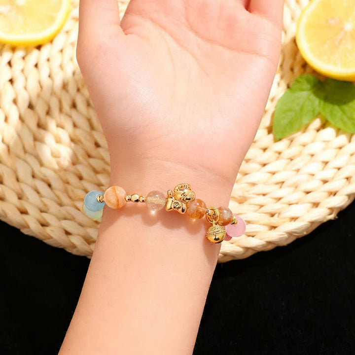 Bracelet de protection en Buddha Stones, année du Cheval, citrine, améthyste et cristaux variés - image 9