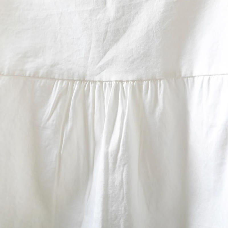 Chemise à manches longues en coton pour femme, ornée de boutons et de plis accordéon blancs à motifs de Buddha Stones - image 6