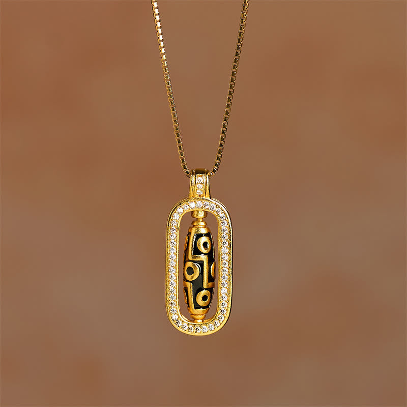 Collier pendentif en laiton plaqué or 24 carats avec perles Dzi à neuf yeux, motif porte-bonheur et symbole de richesse, orné de Buddha Stones. - image 3