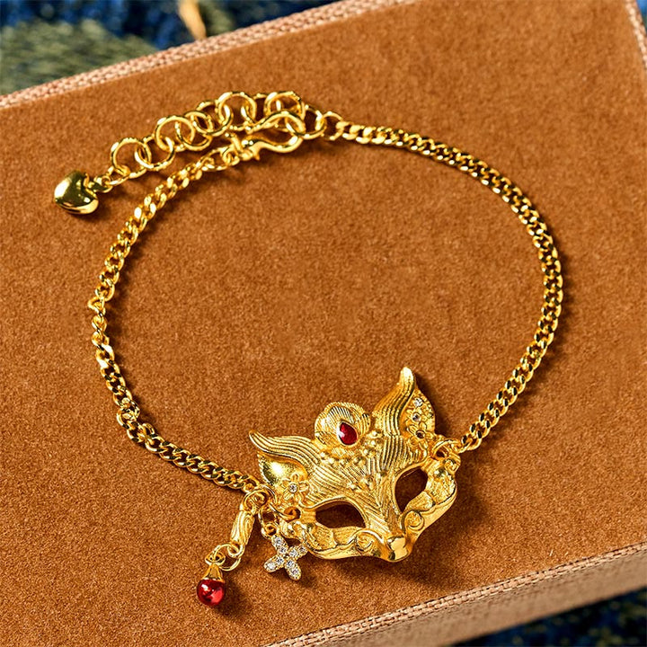 Bracelet à breloque masque de renard en laiton plaqué or 24 carats avec Buddha Stones et chaîne à pompon - image 1