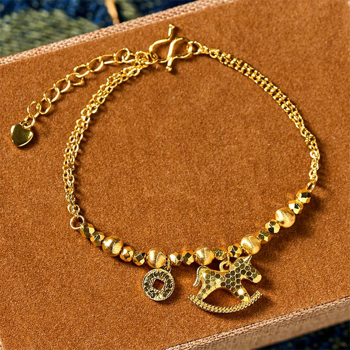 Bracelet porte-bonheur en cuivre plaqué or 24 carats, orné de Buddha Stones l'année du Cheval du zodiaque chinois. - Cheval (Tour de poignet : 14-16 cm) - image 0