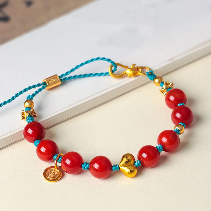 Bracelet de succès en perles d'agate rouge du Sud de 8 mm avec cordon tressé en forme de cœur et Buddha Stones - image 0