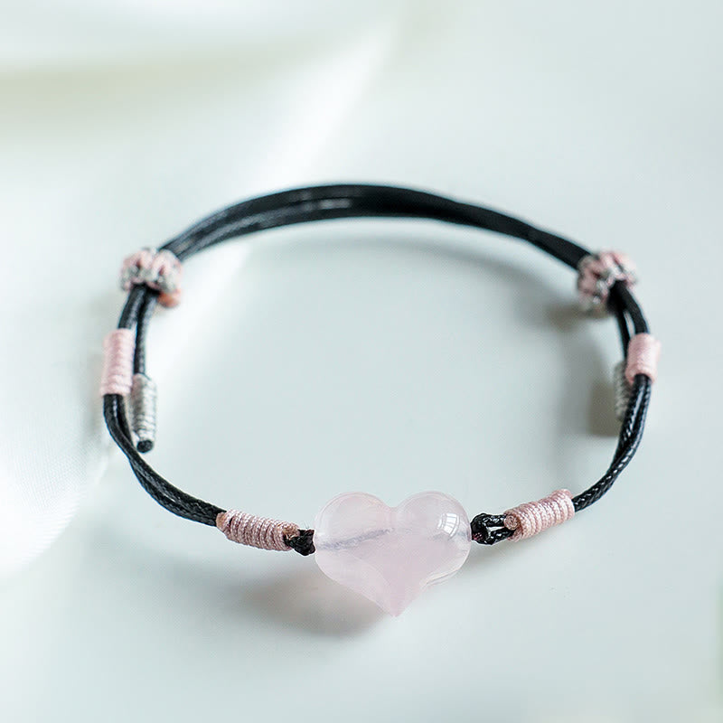 Bracelet chaleureux en Buddha Stones, breloque cœur en cristal rose naturel et cordon tressé. - image 7