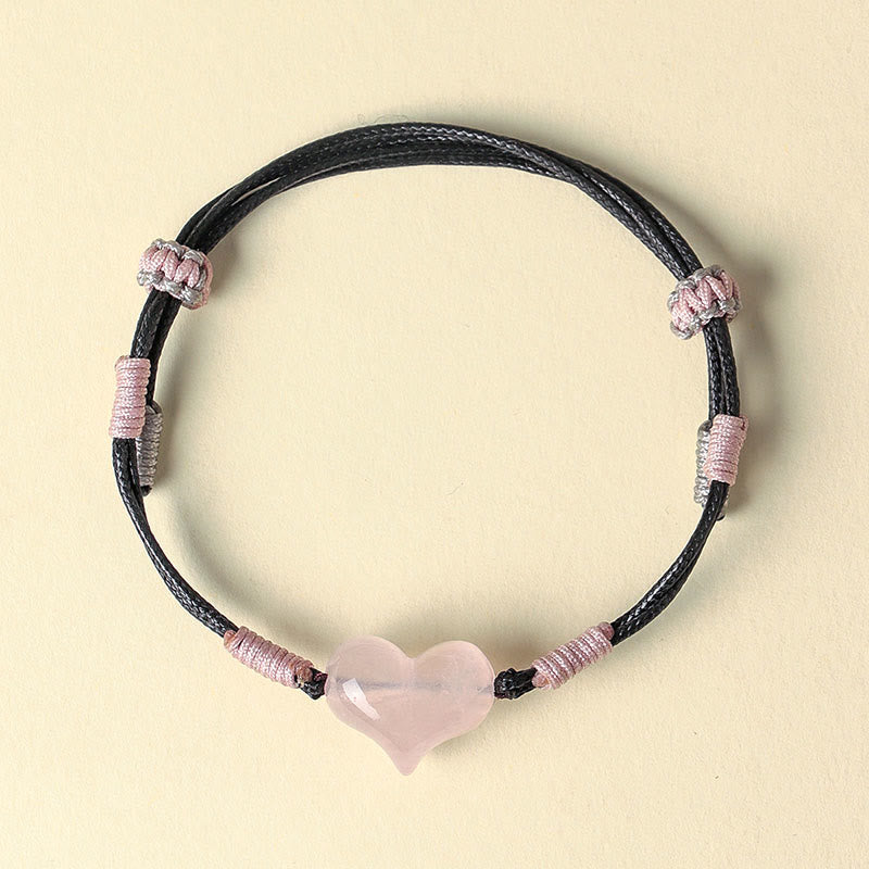 Bracelet chaleureux en Buddha Stones, breloque cœur en cristal rose naturel et cordon tressé. - image 2