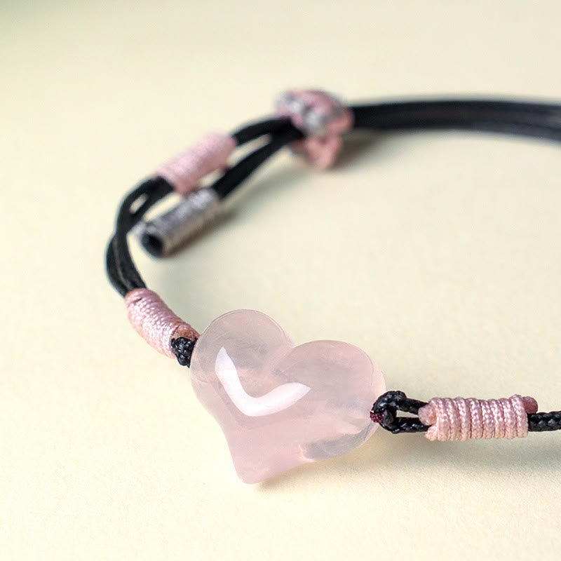 Bracelet chaleureux en Buddha Stones, breloque cœur en cristal rose naturel et cordon tressé. - image 8