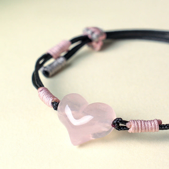 Bracelet chaleureux en Buddha Stones, breloque cœur en cristal rose naturel et cordon tressé. - image 8