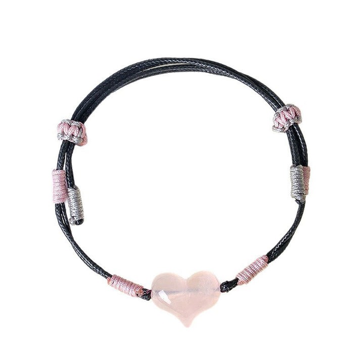 Bracelet chaleureux en Buddha Stones, breloque cœur en cristal rose naturel et cordon tressé. - image 11