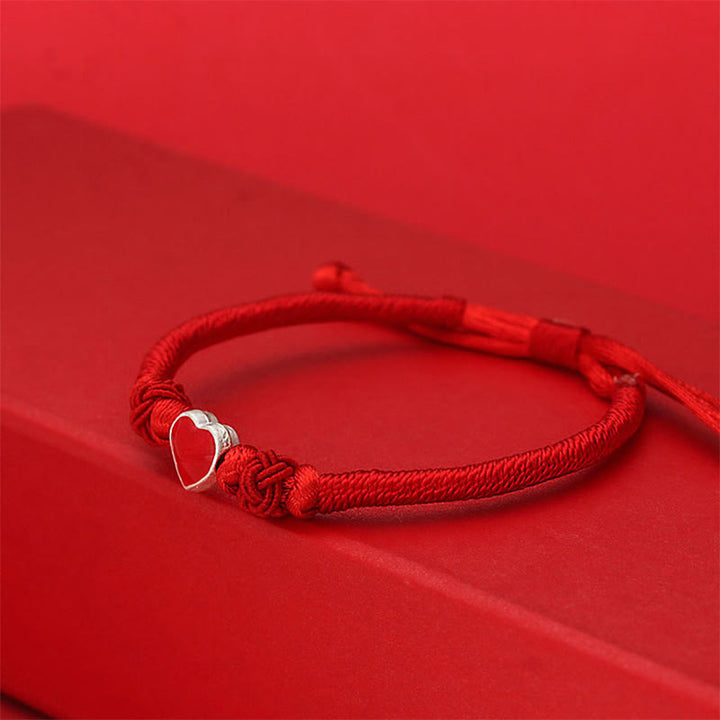 Bracelet en argent sterling 999 avec motif cœur 3D et cordon rouge, orné de Buddha Stones. - image 1