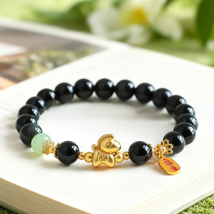 Bracelet de force en Buddha Stones, année du Cheval, jade Hetian, obsidienne noire et agate rouge - image 1