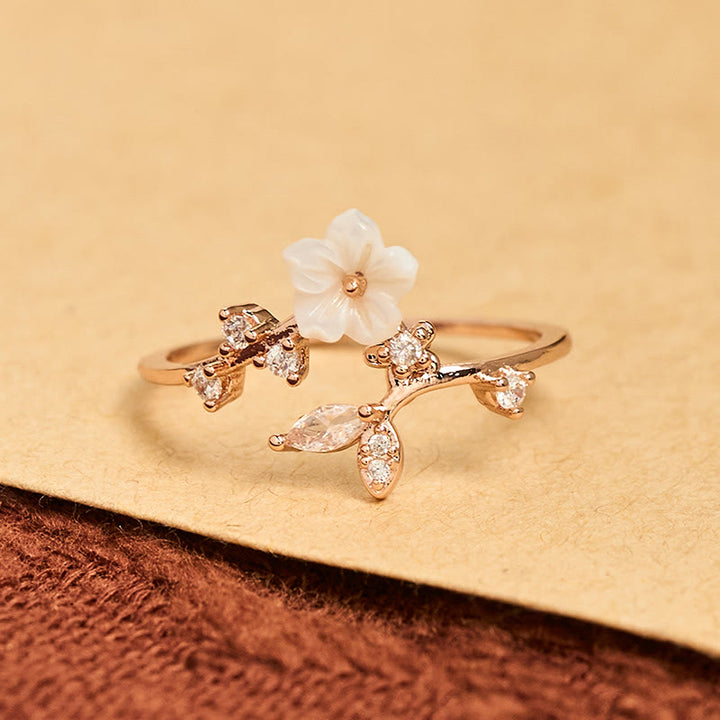 Bague de guérison ajustable en cuivre avec motif de fleur blanche et Buddha Stones - image 1