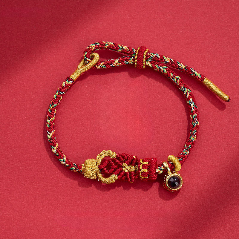 Bracelet de Buddha Stones tissées à la main avec des nœuds de Bouddha - Rouge foncé (Tour de poignet : 14-23 cm) - image 0