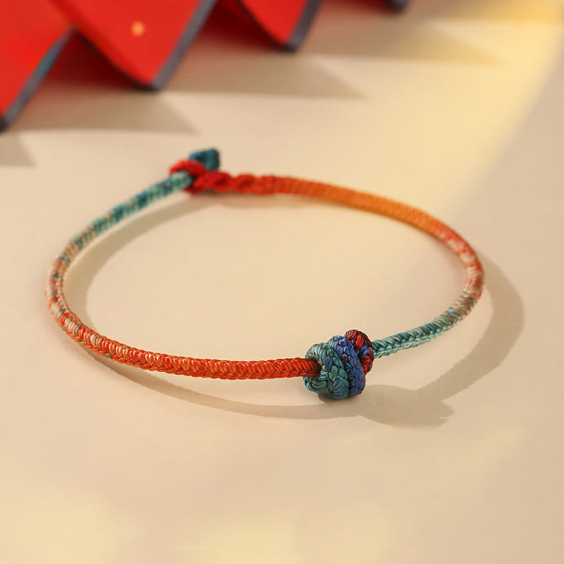 Bracelet de force en Buddha Stones, ficelle colorée tissée à la main avec nœuds, symbole de force - Cordon coloré (tour de poignet 19 cm) - image 0