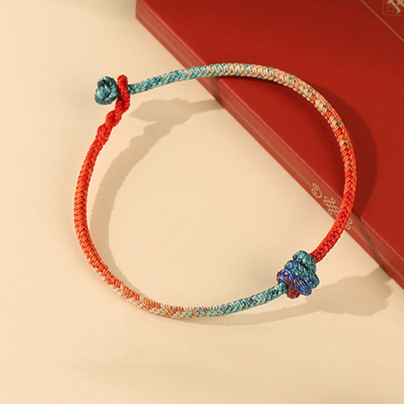 Bracelet de force en Buddha Stones, ficelle colorée tissée à la main avec nœuds, symbole de force - image 1