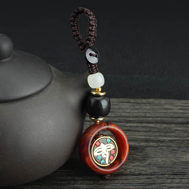 Buddha Stones, bois d'ébène, trèfle à quatre feuilles sanskrit, œil de Bouddha, porte-clés rotatif de paix - Motif de l'œil de Bouddha - image 6