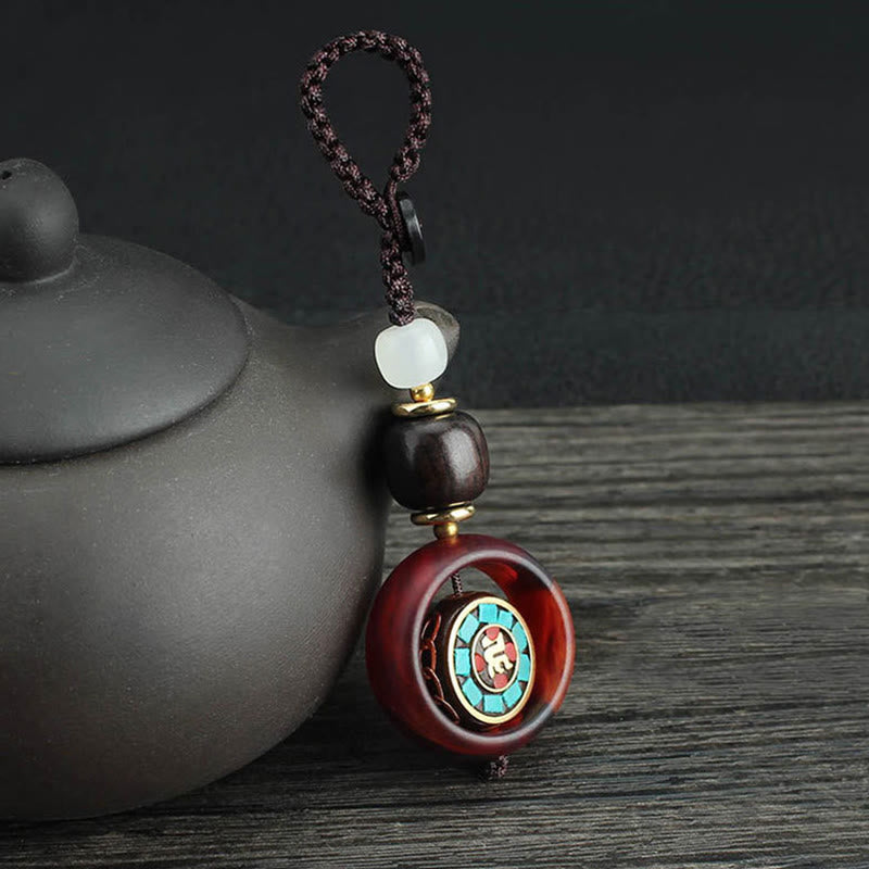 Buddha Stones, bois d'ébène, trèfle à quatre feuilles sanskrit, œil de Bouddha, porte-clés rotatif de paix - Modèle sanskrit - image 0